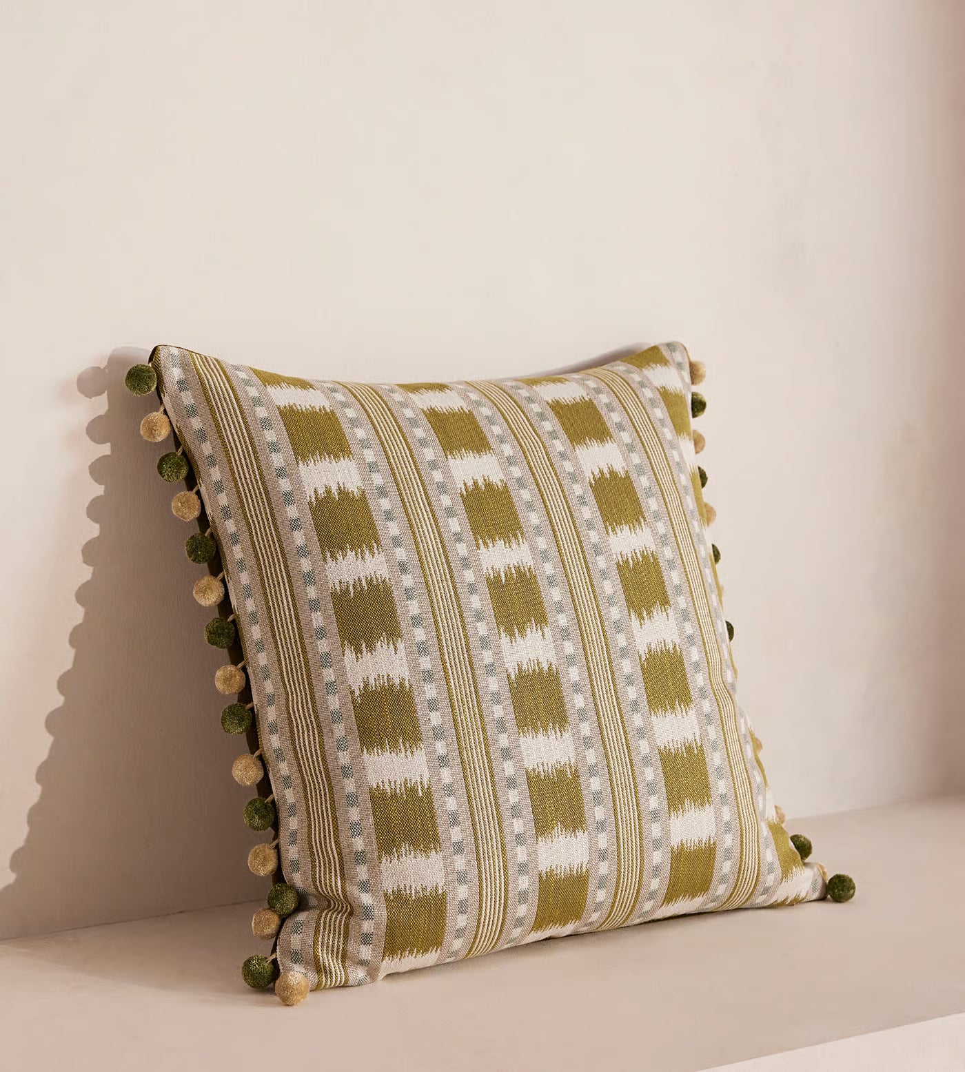 Olive Striped Ikat Pom Pom Cushion