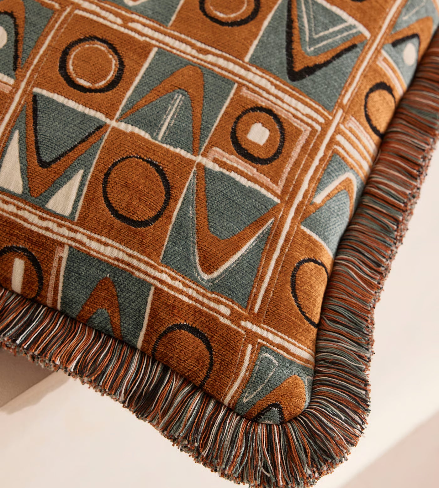 Earth Tone Geometric Fringed Throw Pillow