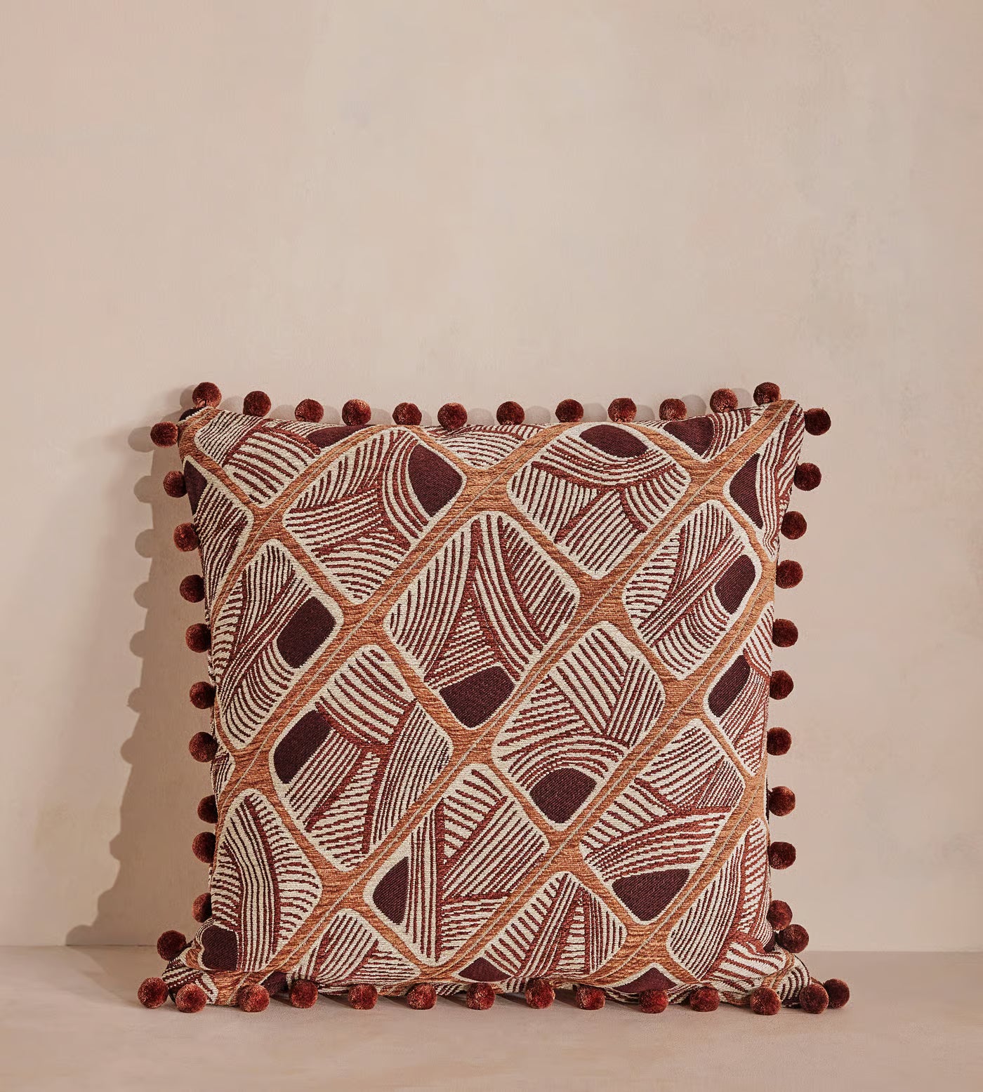 Embroidered Geometric Pom Pom Accent Pillow