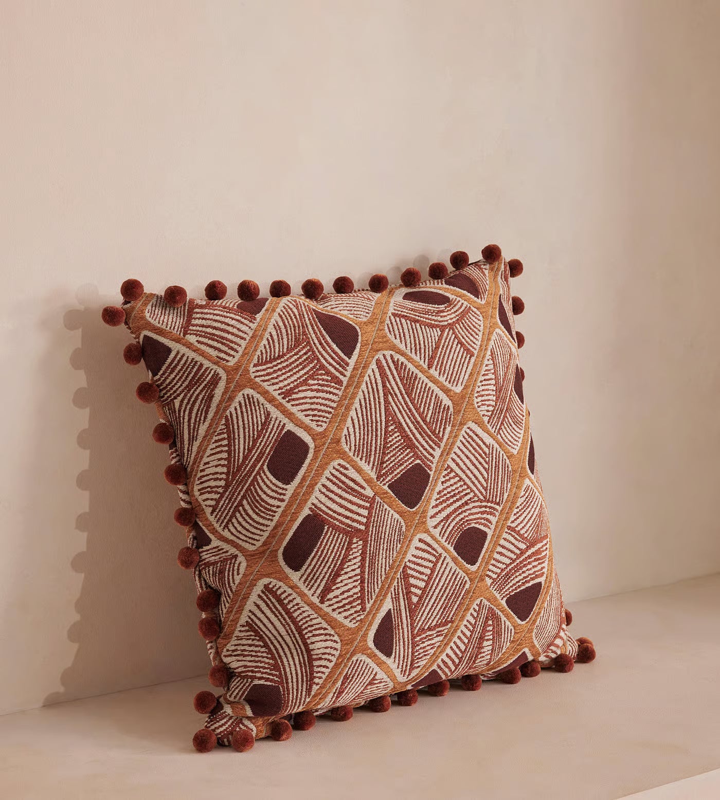 Embroidered Geometric Pom Pom Accent Pillow