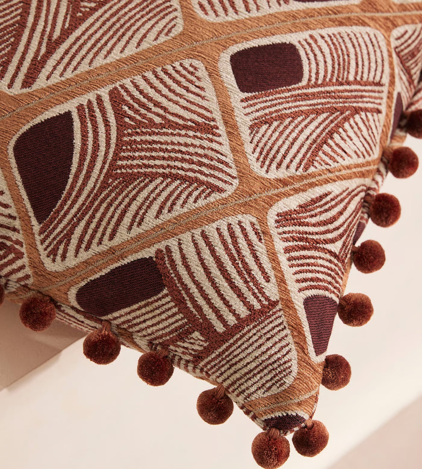 Embroidered Geometric Pom Pom Accent Pillow