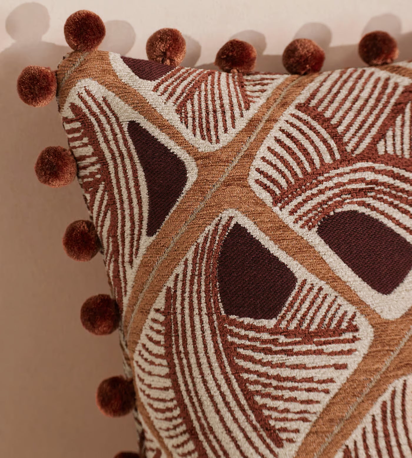 Embroidered Geometric Pom Pom Accent Pillow