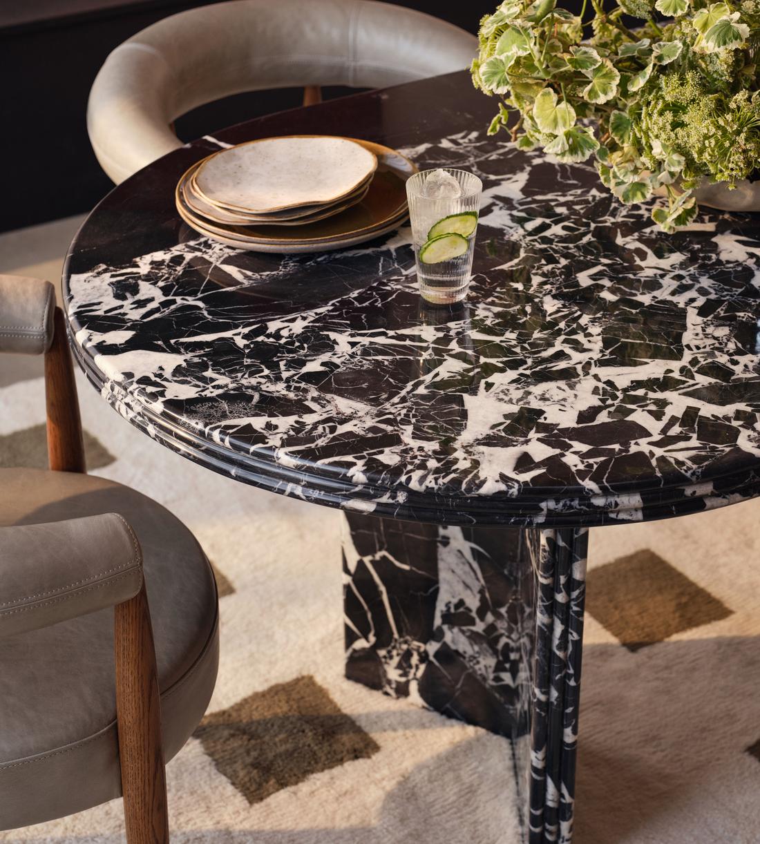 Architectural Oval Black Stone Dining Table