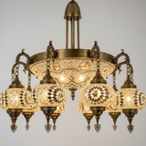 Close-up of the handcrafted mosaic glass detail on a luxury 10-light chandelier