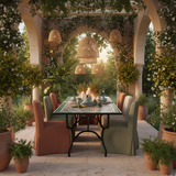 Olive gold and moss zellige mosaic rectangular dining table in a lush indoor-outdoor covered garden pergola with trailing jasmine rattan pendants linen chairs and tagine dishes