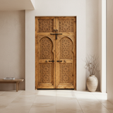 Natural wood hand-carved Moroccan double door installed in a refined contemporary home