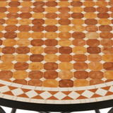 Close-up of warm honey amber and terracotta zellige mosaic tile pattern with diamond border