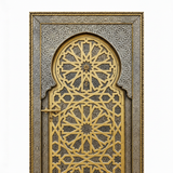 Close-up of brass geometric star medallion and engraved silver-tone metalwork