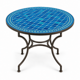 Round zellige mosaic dining table with vivid cobalt blue basketweave tile top and dark wrought iron curved base