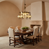 Handcrafted 10-light mosaic chandelier above a luxury Mediterranean dining table