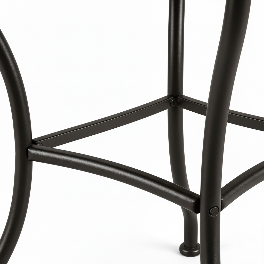 Dark matte black wrought iron table base with outward-splaying curved legs and central arched stretcher brace detail