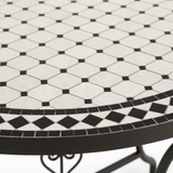 Close-up macro of classic black and white zellige octagon-and-dot tile pattern with fine alternating black and white diamond border