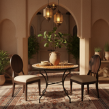 Honey amber zellige mosaic table styled in a warm Moroccan riad interior dining space
