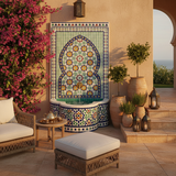 Moroccan zellige fountain in luxury Mediterranean garden patio with bougainvillea and lanterns