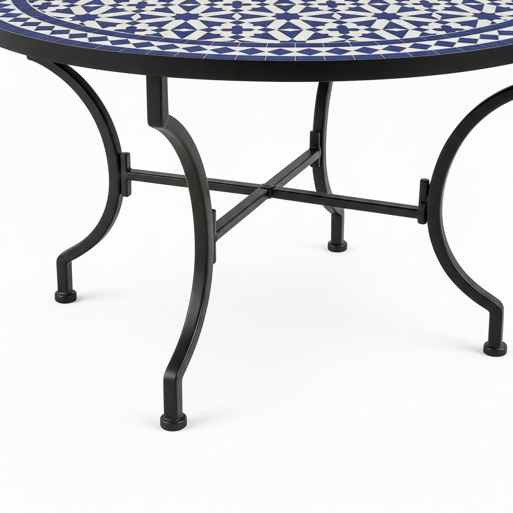 Dark matte black wrought iron table base with curved outward-splaying legs and flat X-cross stretcher brace detail