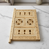 Berber wooden window flat lay on white marble table