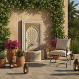 Moroccan mosaic fountain on warm plaster wall in luxury Mediterranean outdoor patio